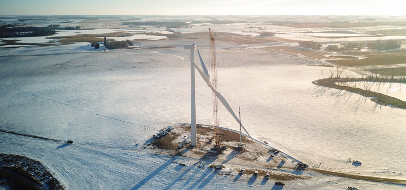 Arial view of a wind turbine being constructed.