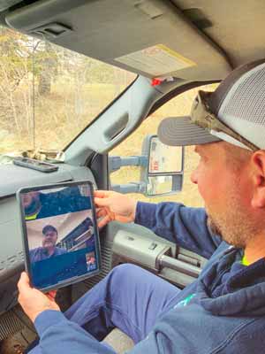 Linemen tune in remotely for their  safety meeting.